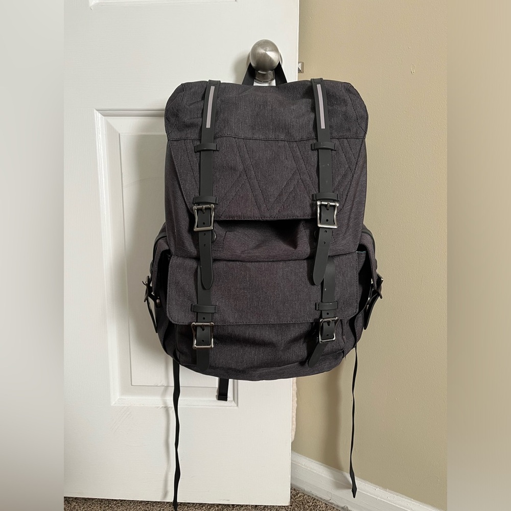 Grey multiple packets canvas unisex backpack